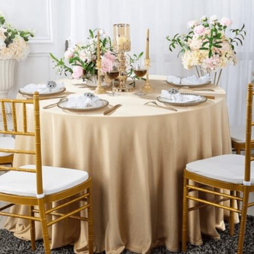 round tablecloth rentals ottawa on a round table with gold chivari chairs