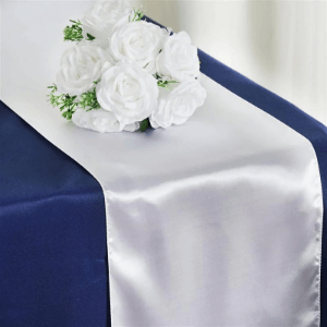 Party rentals - Silver table runner on navy blue tablecloth